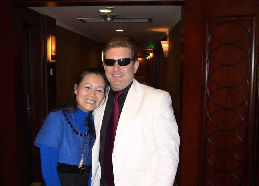 A photo of an Asian woman and a Western man